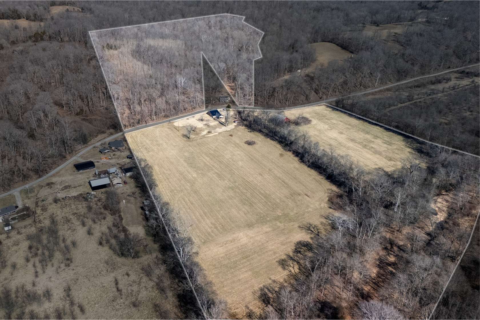 41.4 Acres of Recreational Land with Home for Sale in Indian Mound, Tennessee