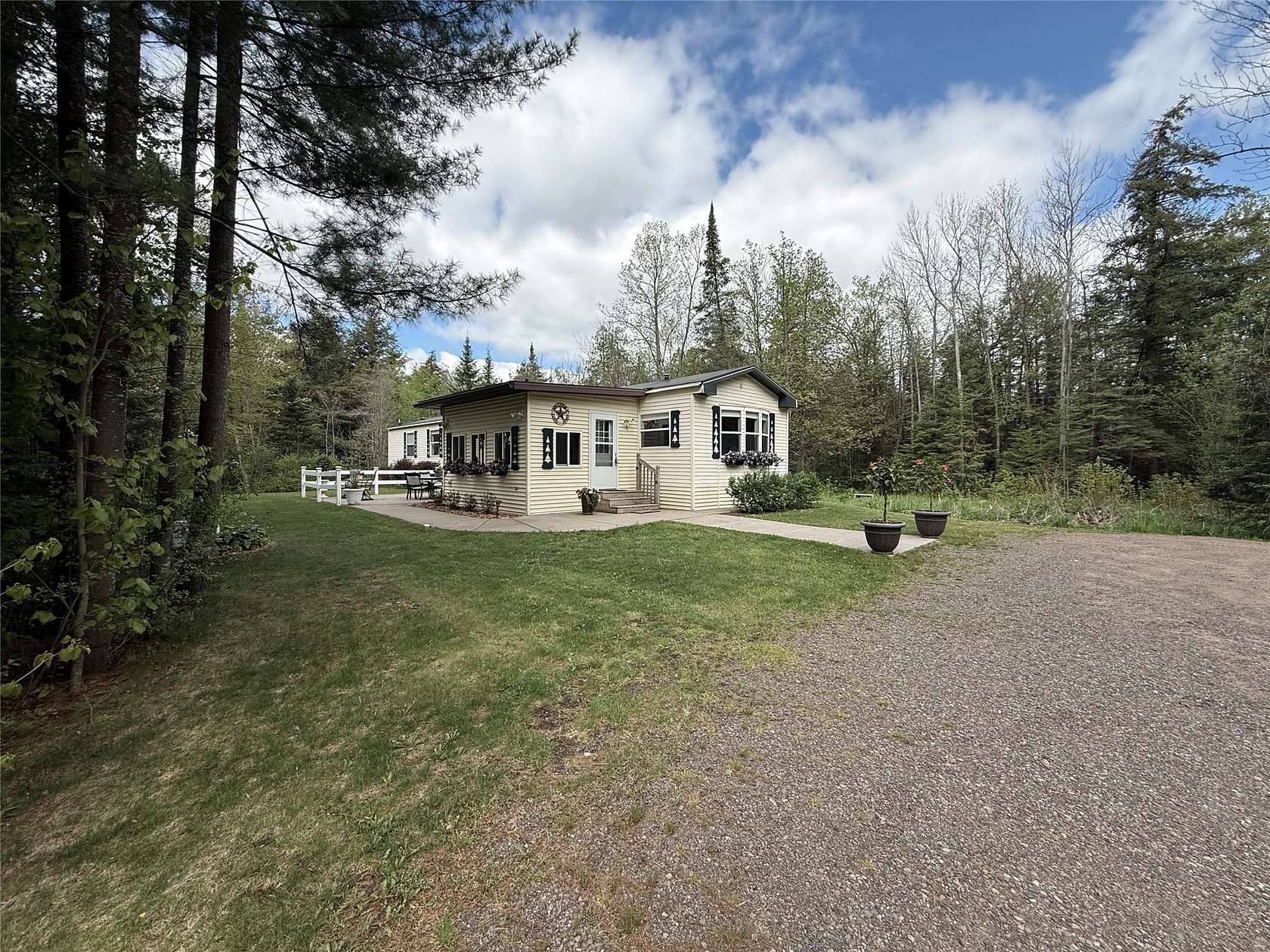 60 Acres of Land with Home for Sale in Cornell, Wisconsin