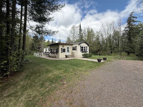 60 Acres of Land with Home for Sale in Cornell, Wisconsin