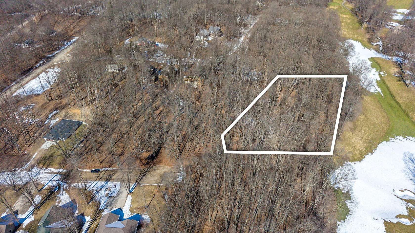 0.72 Acres of Residential Land for Sale in Canadian Lakes, Michigan