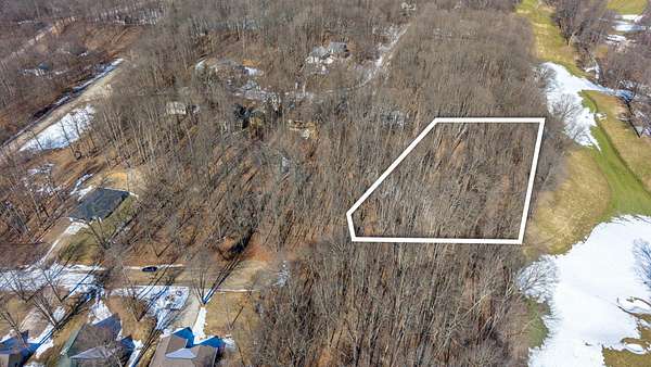 0.72 Acres of Residential Land for Sale in Canadian Lakes, Michigan