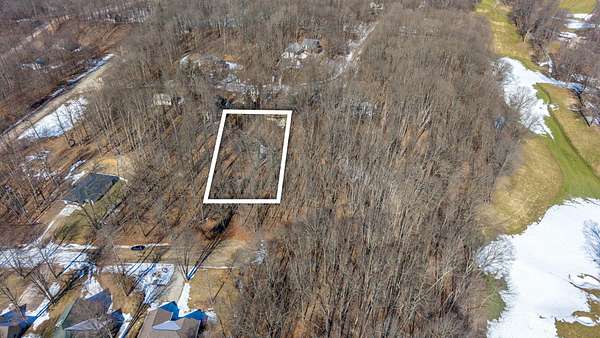 0.33 Acres of Residential Land for Sale in Canadian Lakes, Michigan