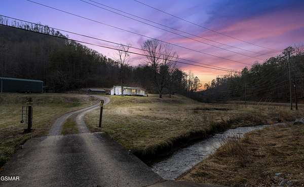 56.7 Acres of Recreational Land with Home for Sale in Sevierville, Tennessee