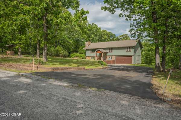 10 Acres of Recreational Land with Home for Sale in Neosho, Missouri