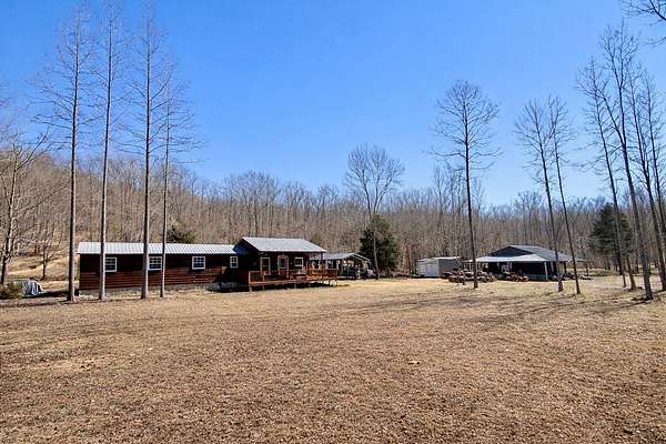 46.7 Acres of Recreational Land with Home for Sale in Lobelville, Tennessee