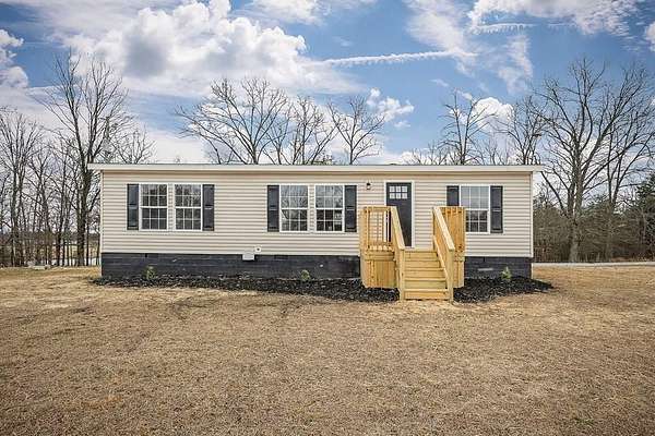 7 Acres of Land with Home for Sale in Coalmont, Tennessee