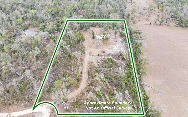 4.88 Acres of Land with Home for Sale in Live Oak, Florida