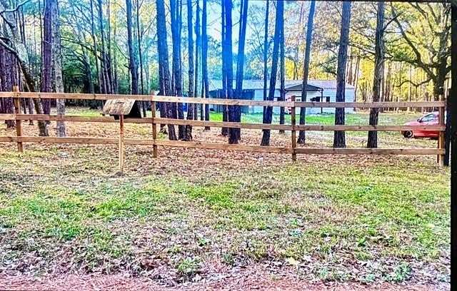 2.2 Acres of Land with Home for Sale in Corrigan, Texas