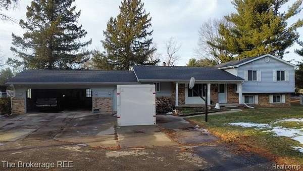 9 Acres of Land with Home for Sale in Holly Township, Michigan