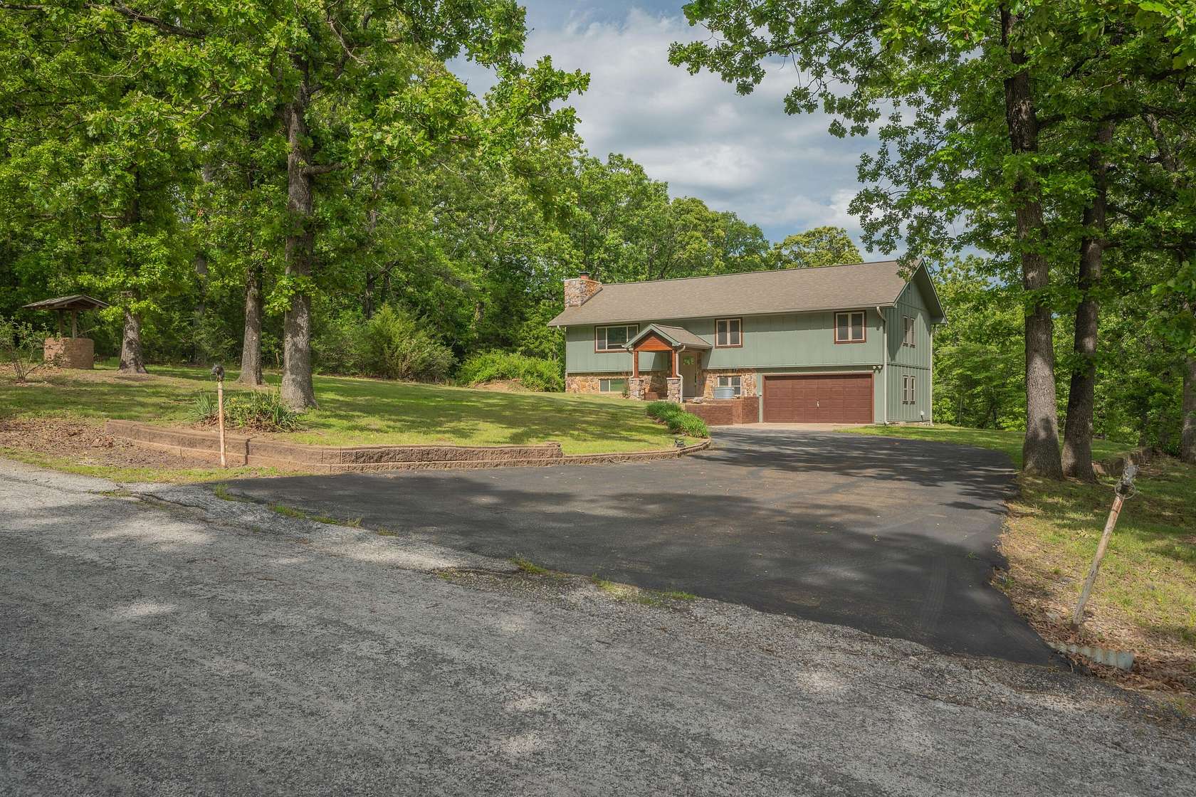 11 Acres of Recreational Land with Home for Sale in Neosho, Missouri