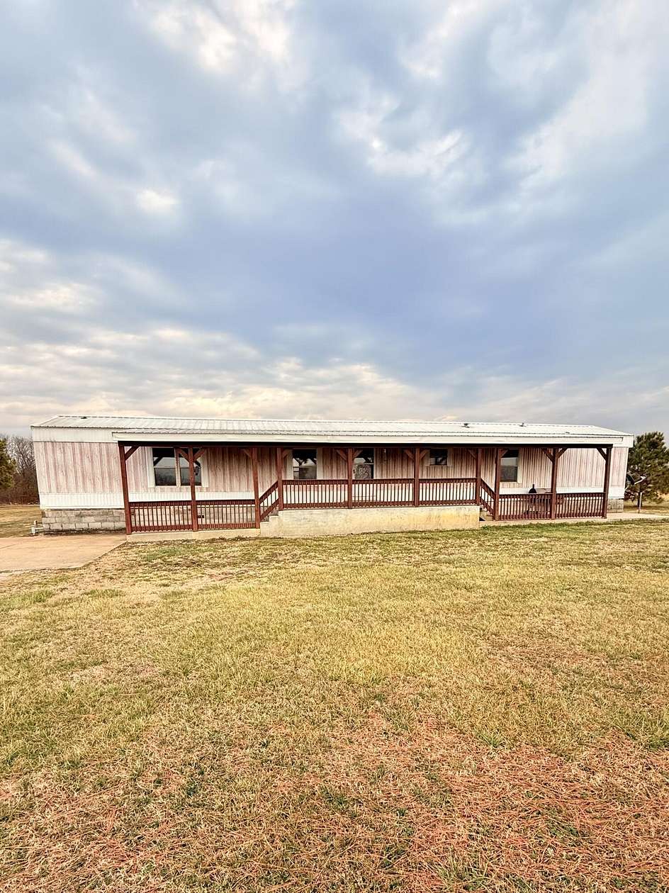 5 Acres of Land with Home for Sale in Bluejacket, Oklahoma