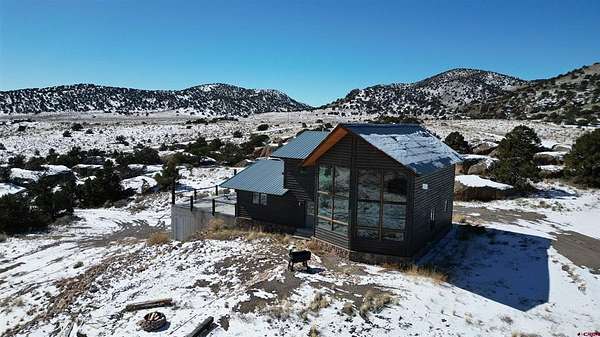 37.2 Acres of Recreational Land with Home for Sale in Del Norte, Colorado