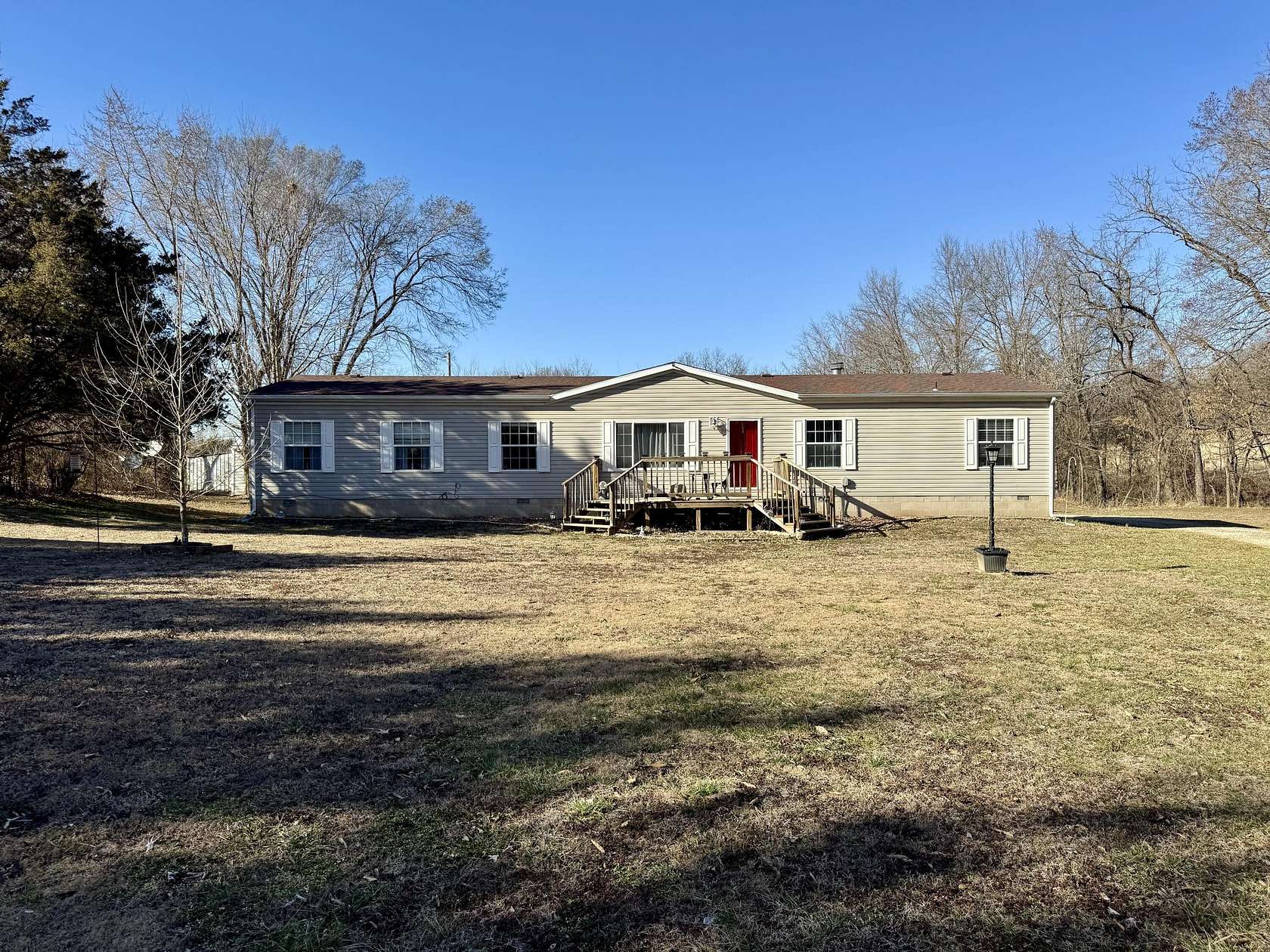 5 Acres of Land with Home for Sale in Humansville, Missouri