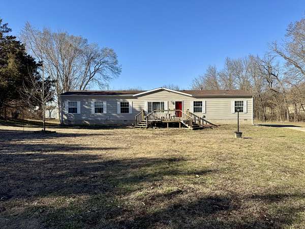 5 Acres of Land with Home for Sale in Humansville, Missouri