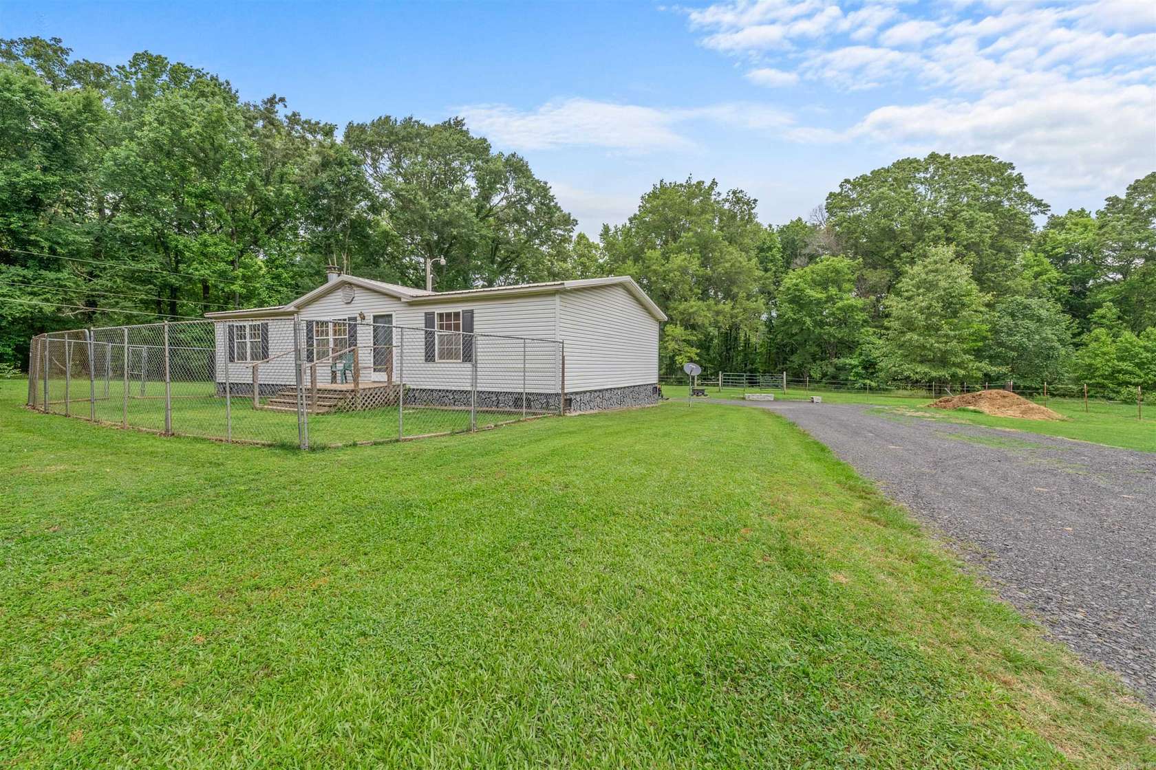 6.56 Acres of Land with Home for Sale in Austin, Arkansas