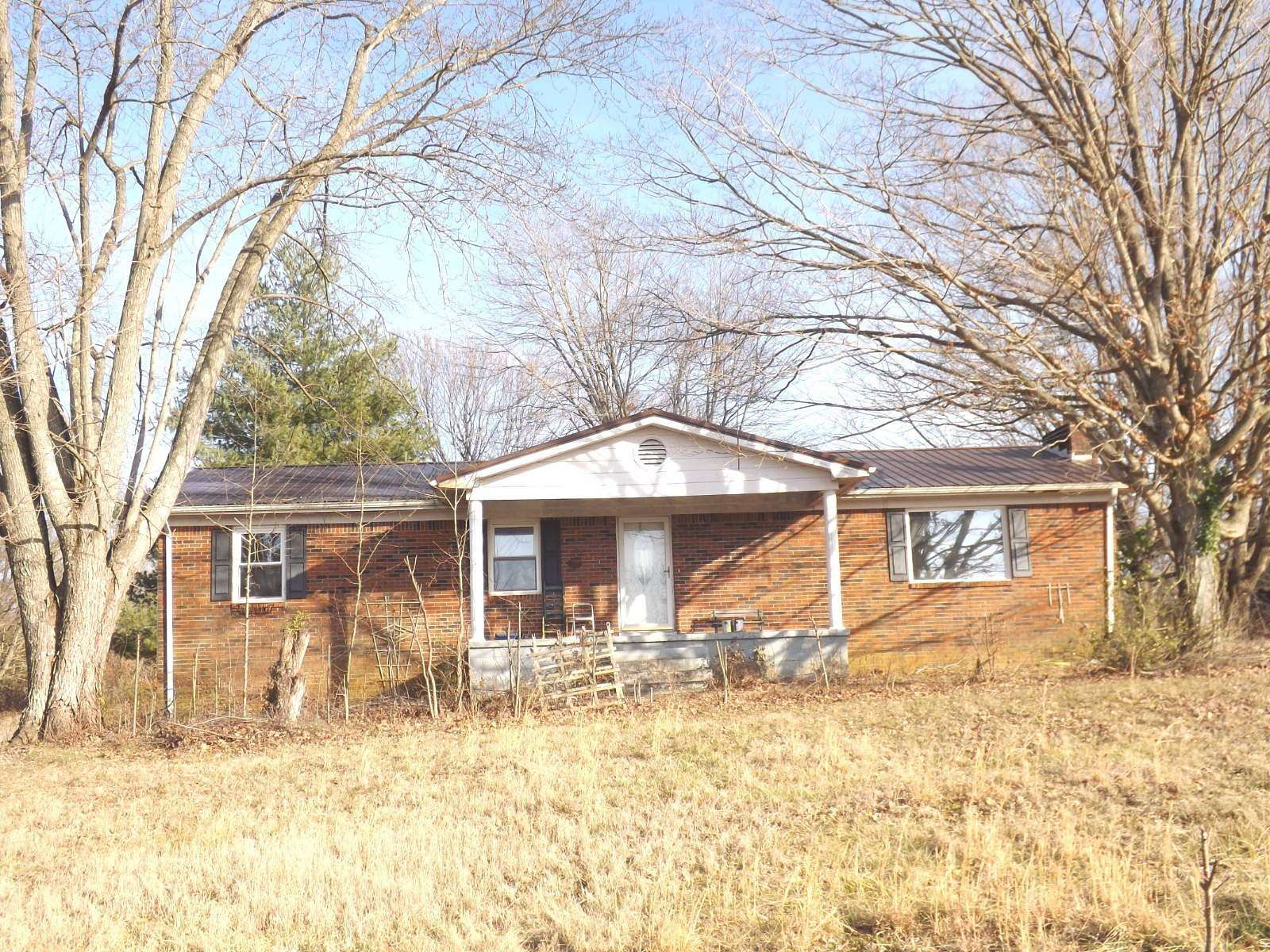 2.36 Acres of Land with Home for Auction in Glasgow, Kentucky