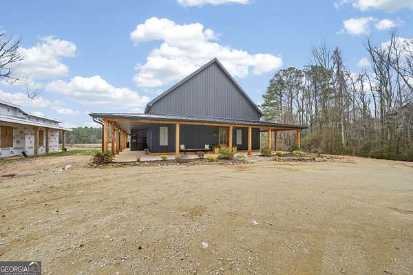 9.27 Acres of Land with Home for Sale in White Plains, Georgia