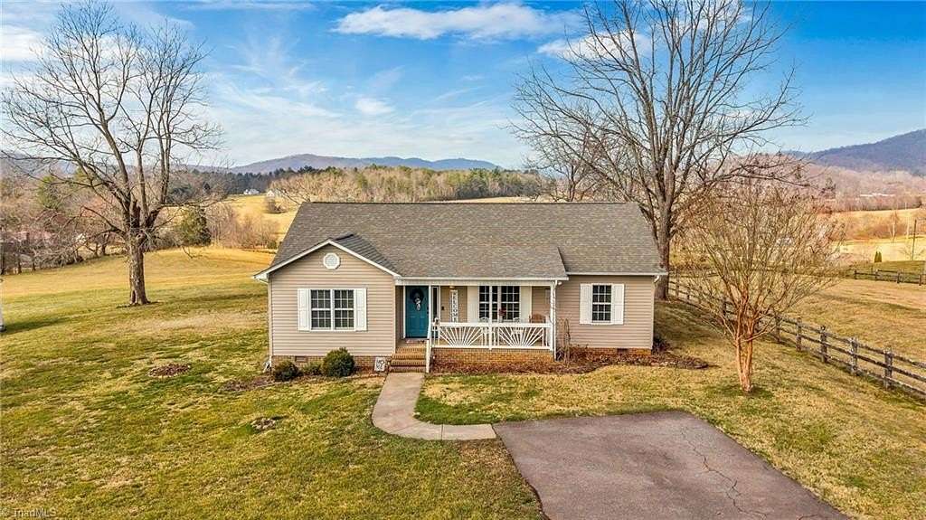 6 Acres of Land with Home for Sale in Purlear, North Carolina