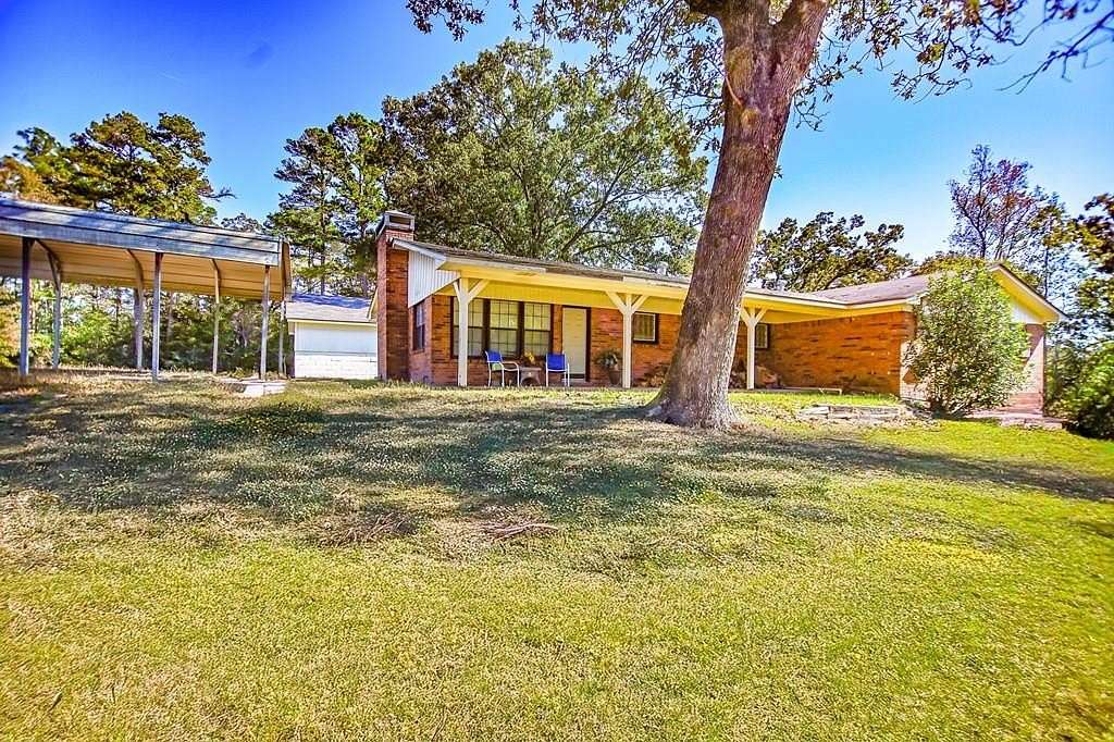 2 Acres of Land with Home for Sale in Timpson, Texas