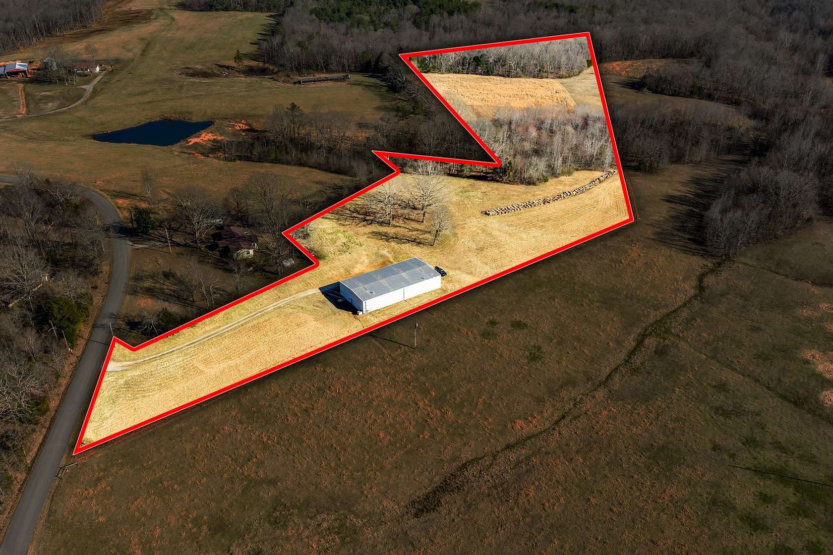 10.7 Acres of Recreational Land with Home for Sale in McEwen, Tennessee