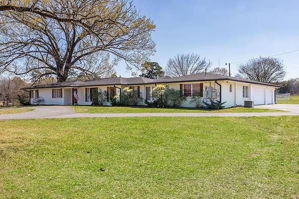 9.36 Acres of Land with Home for Sale in Lufkin, Texas