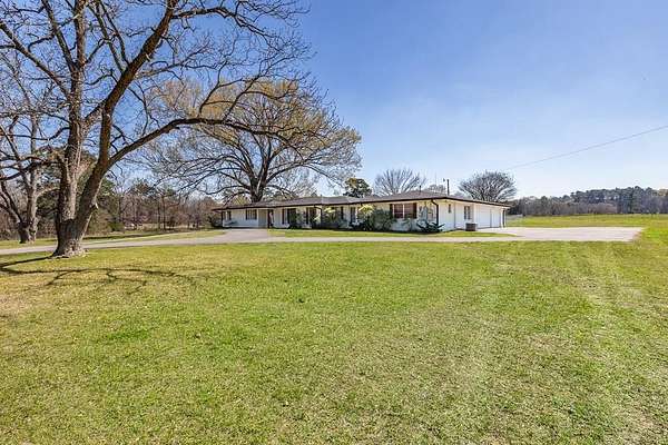 9.36 Acres of Land with Home for Sale in Lufkin, Texas