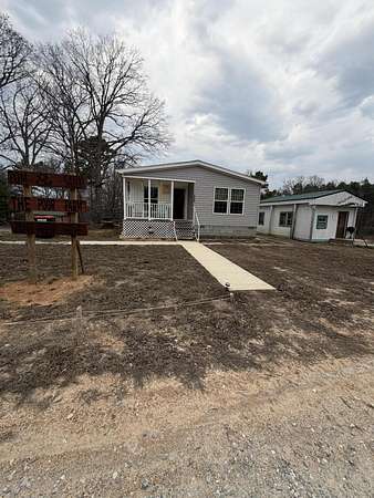 1.5 Acres of Land with Home for Sale in Raymondville, Missouri