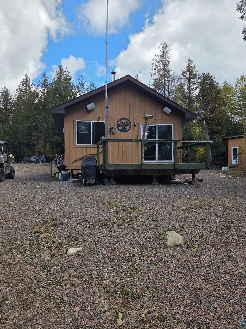 15.3 Acres of Recreational Land with Home for Sale in Hovland, Minnesota