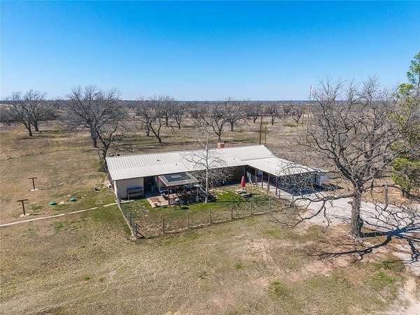 30.8 Acres of Land with Home for Sale in Carbon, Texas