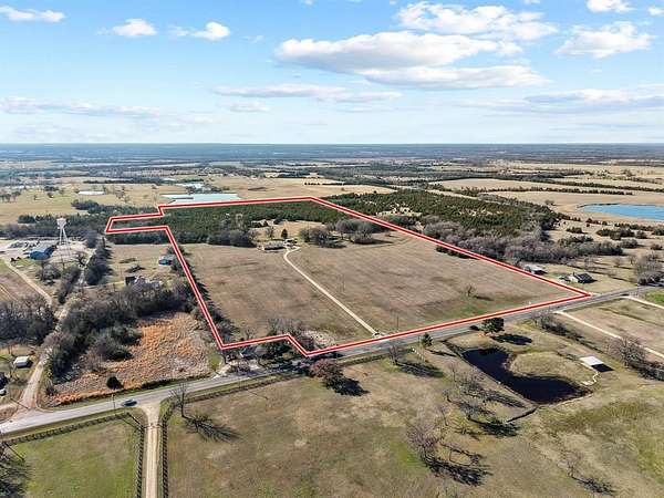 51.5 Acres of Land with Home for Sale in Paris, Texas