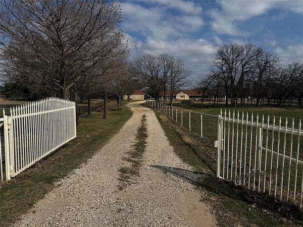 4.83 Acres of Land with Home for Lease in Collinsville, Texas