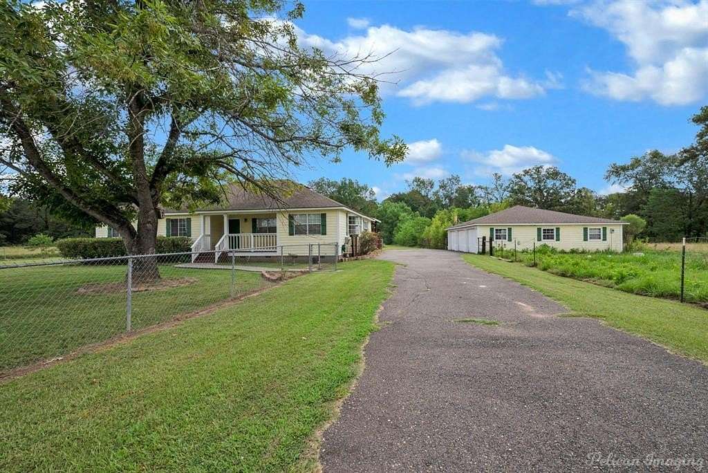 14.3 Acres of Land with Home for Sale in Frierson, Louisiana