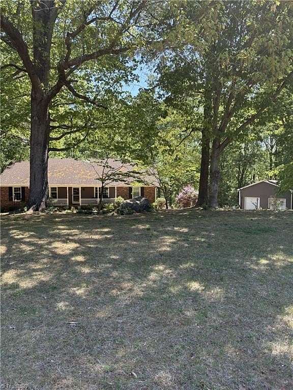 2.33 Acres of Land with Home for Sale in Summerfield, North Carolina