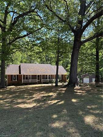 2.33 Acres of Land with Home for Sale in Summerfield, North Carolina