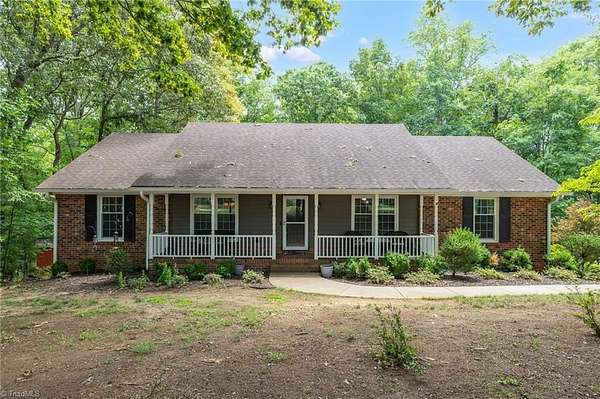 2.33 Acres of Land with Home for Sale in Summerfield, North Carolina