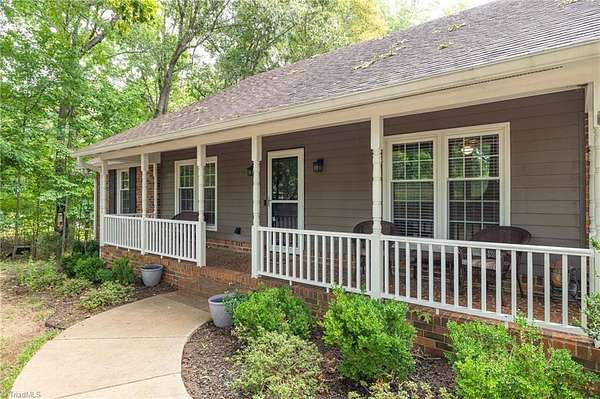 2.33 Acres of Land with Home for Sale in Summerfield, North Carolina