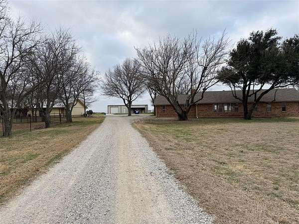 8.68 Acres of Land with Home for Lease in Krum, Texas