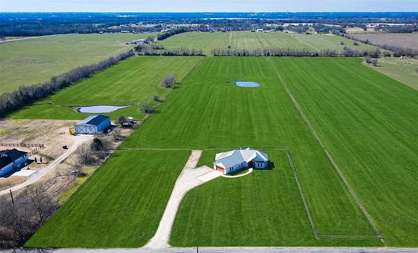10.7 Acres of Land with Home for Sale in Van Alstyne, Texas
