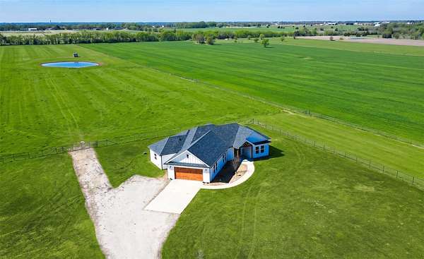 10.7 Acres of Land with Home for Sale in Van Alstyne, Texas