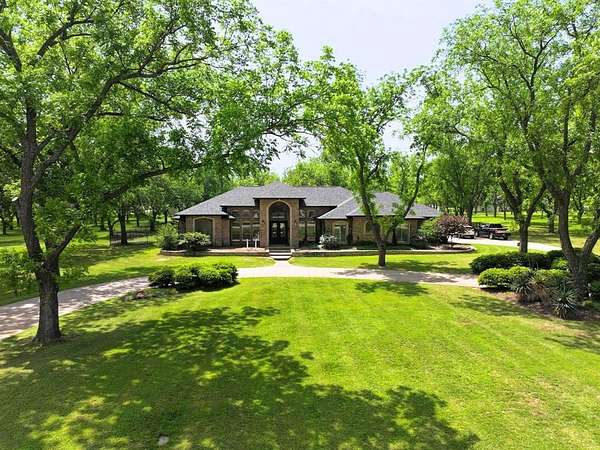 2.3 Acres of Land with Home for Sale in Granbury, Texas