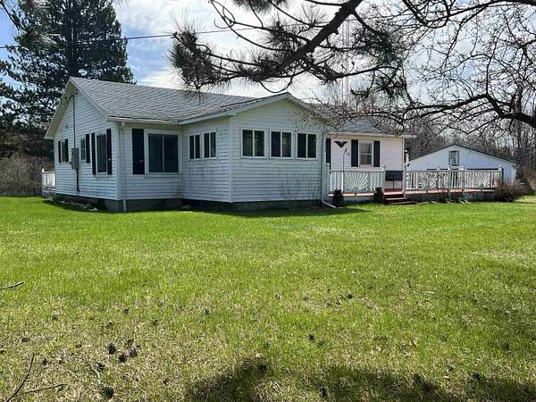 15 Acres of Recreational Land with Home for Sale in Harrison, Michigan