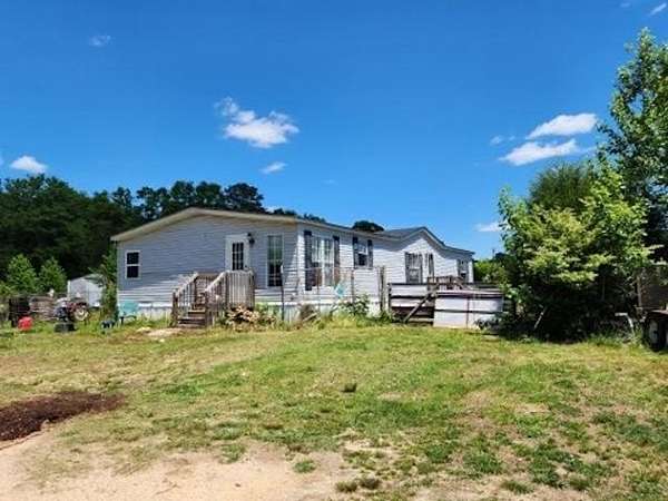 5.2 Acres of Land with Home for Sale in Belton, South Carolina