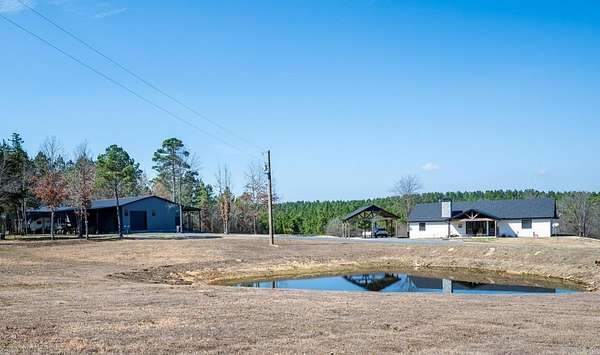 20 Acres of Recreational Land with Home for Sale in Cove, Arkansas