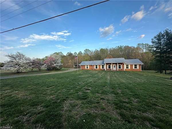 4.66 Acres of Land with Home for Sale in Lawsonville, North Carolina