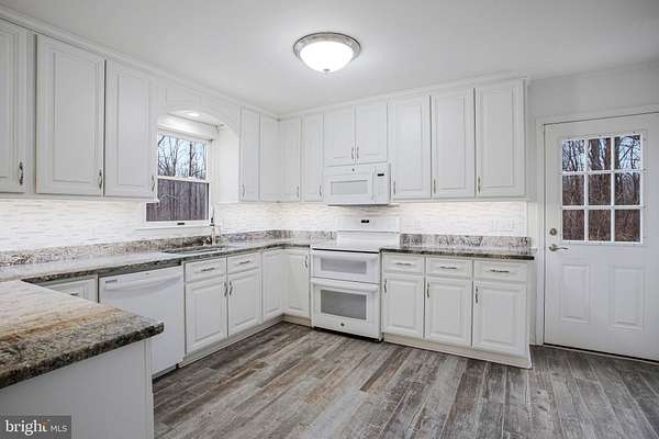 4.43 Acres of Land with Home for Sale in Huntingtown, Maryland