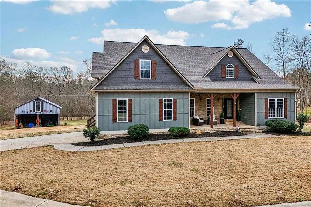 10.4 Acres of Land with Home for Sale in Powder Springs, Georgia