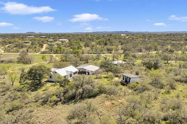 10.2 Acres of Land with Home for Sale in Llano, Texas