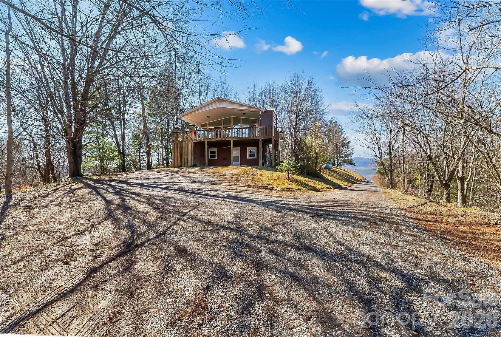 6.16 Acres of Land with Home for Sale in Marshall, North Carolina