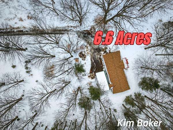 6.6 Acres of Land with Home for Sale in Scottville, Michigan