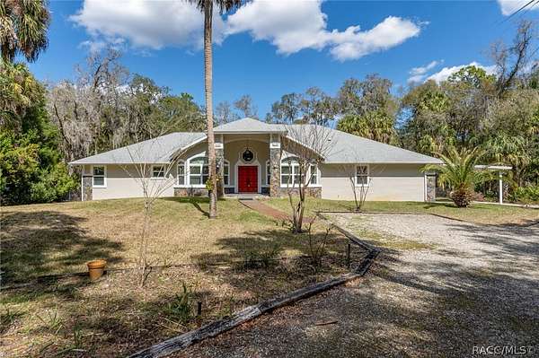 1.7 Acres of Land with Home for Sale in Inglis, Florida
